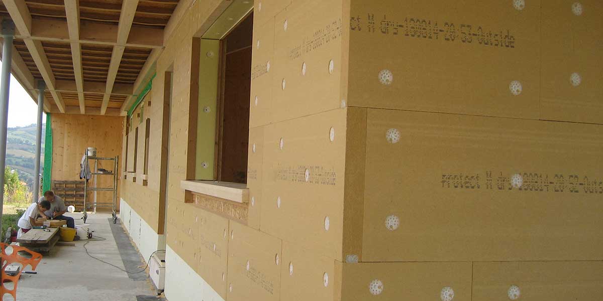 Wood fiber insulating walls